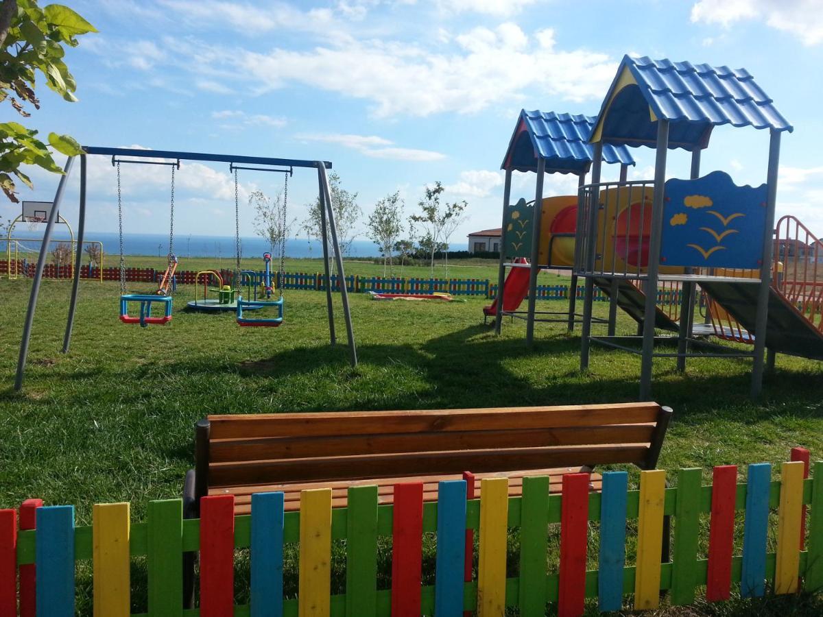 Lighthouse Golf & Spa Hotel Balchik Exterior photo Playground in the village